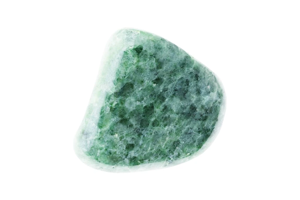A jadeite crystal on a white background