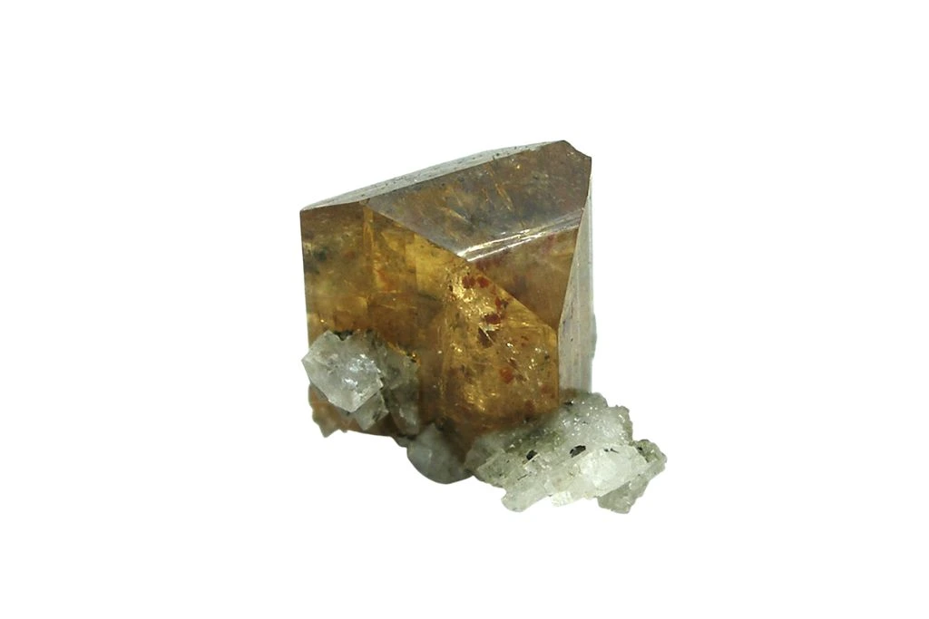 A Kainosite crystal on a white background
