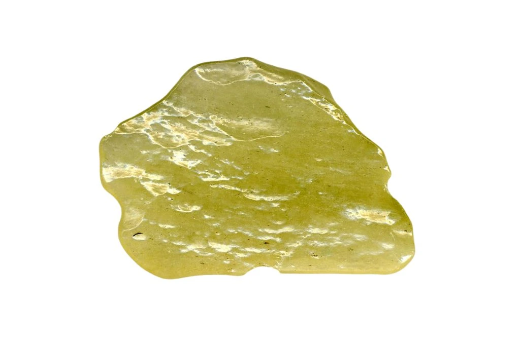 libyan desert glass rock on white background