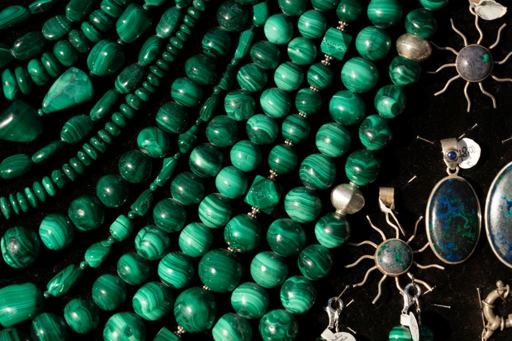 close up photo of malachite jewelry