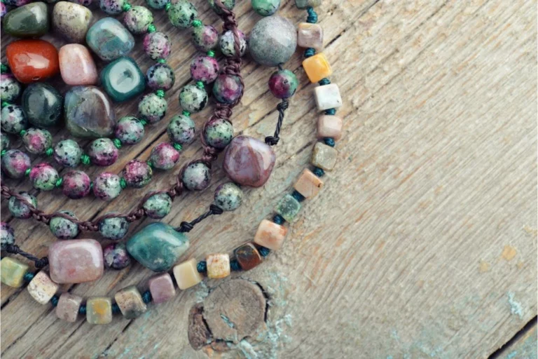necklaces with Semiprecious stones on a wooden background