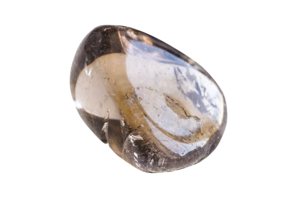 Polished smoky quartz on white background