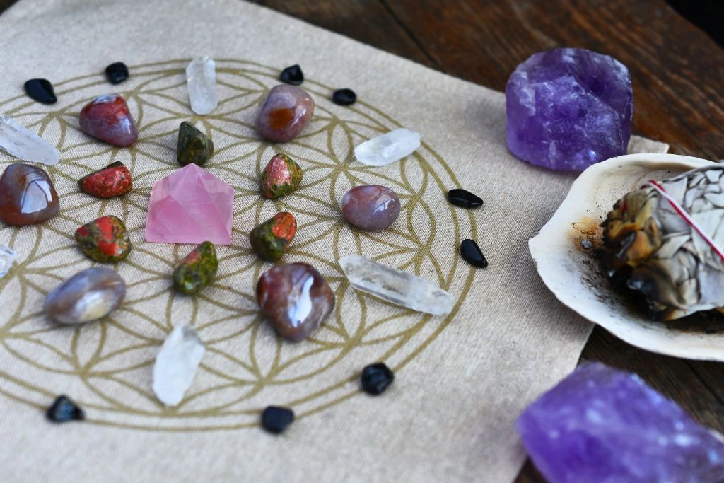 crystal grid for healing placed on top of wooden background