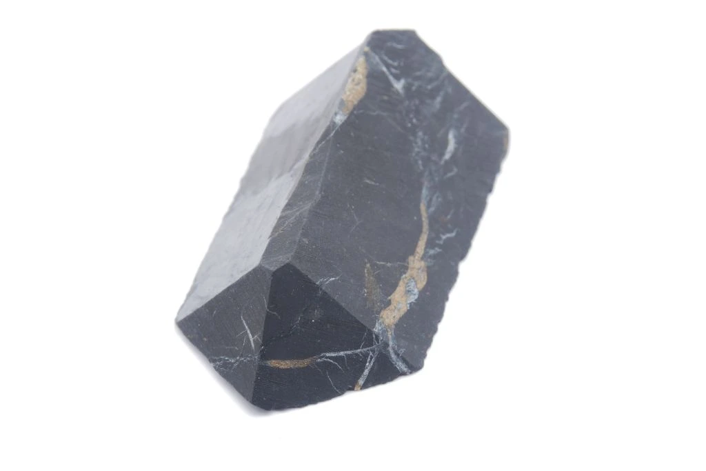 raw shungite on a white background