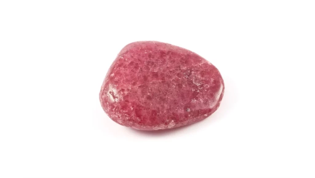 polished strawberry quartz on white background