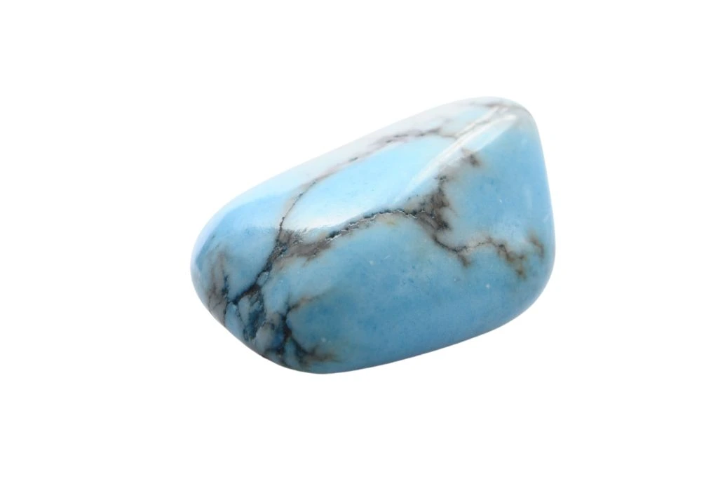 polished turquoise on white background