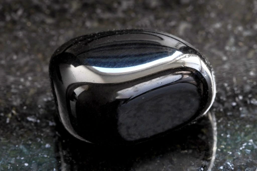 Black Onyx placed on top a marble platform