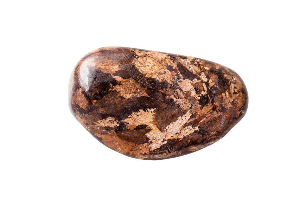 bronzite stone on white background