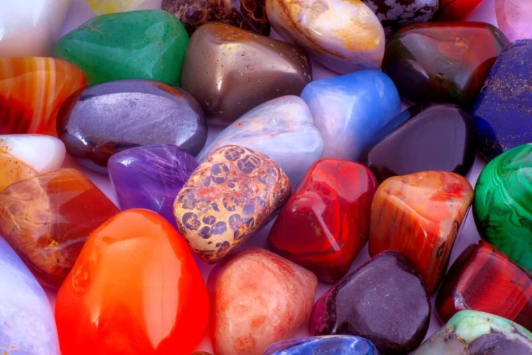 collection of different colors and types polished and tumbled gemstones