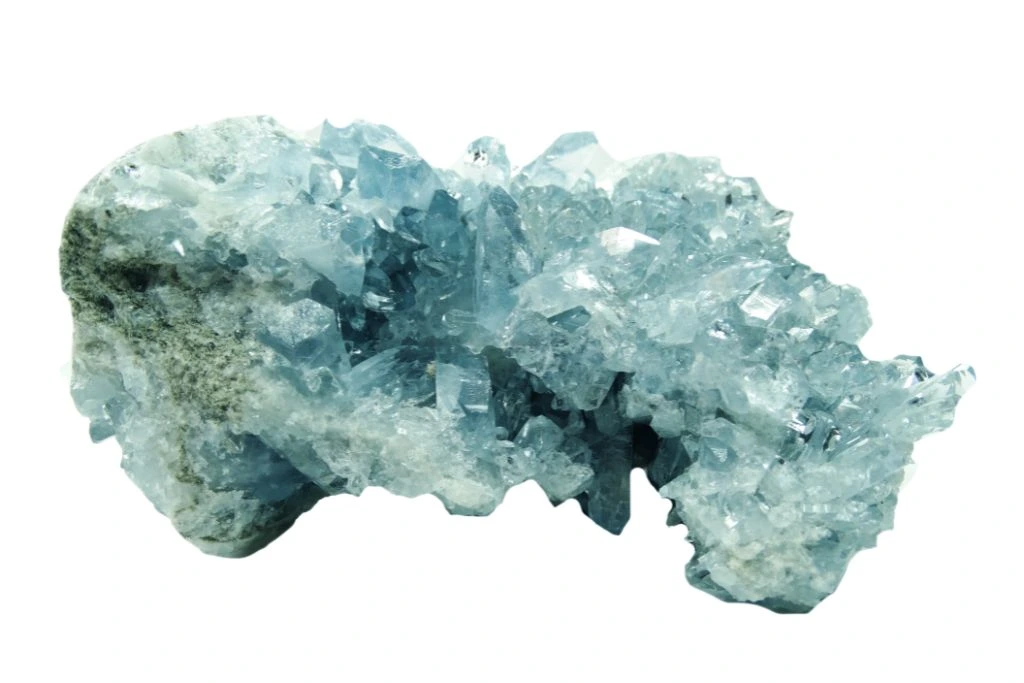 celestite geode rock on a white background