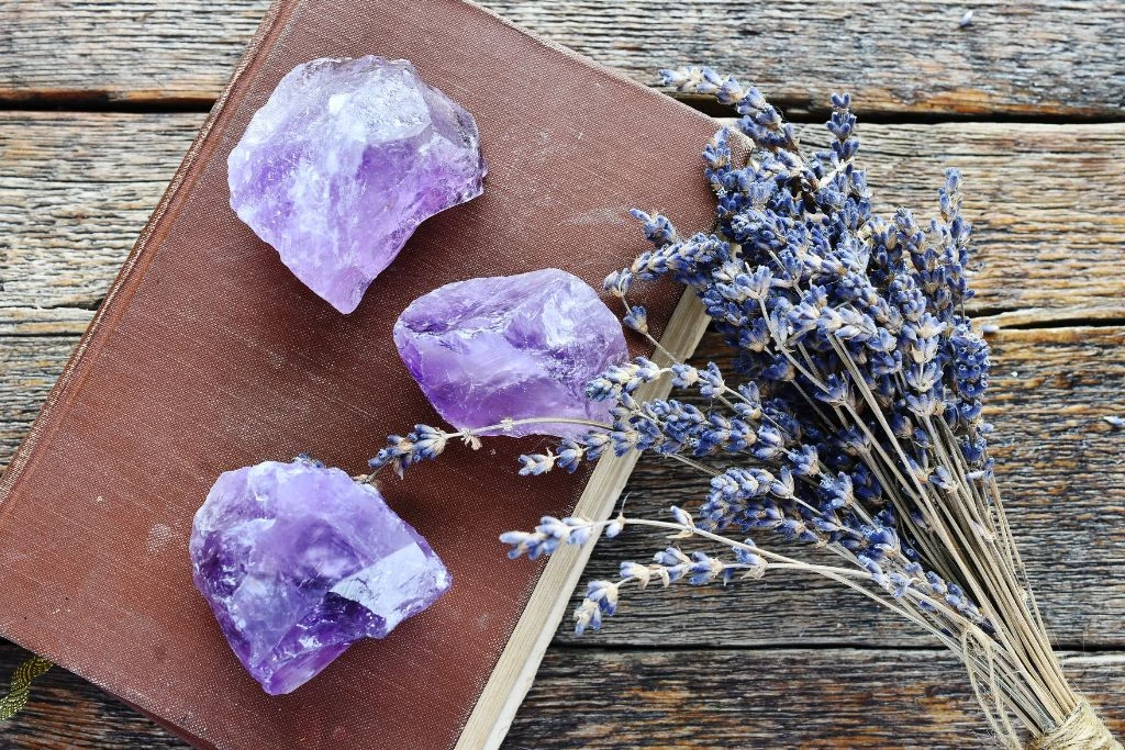 Amethysts crystals on a book