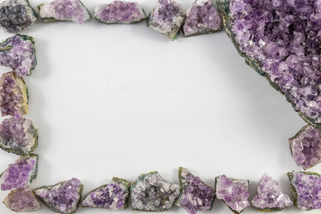 Amethysts crystals that are lined up to look like a picture frame