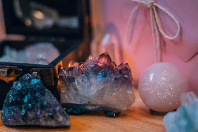 Different kinds of crystals on table