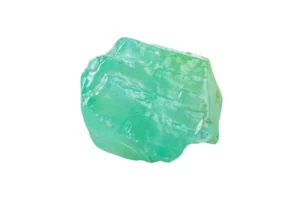 A piece of green gemstone on white background