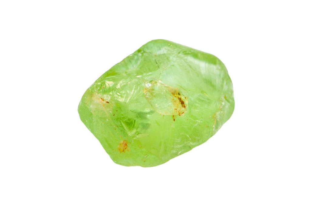 Olivine crystal on a white background