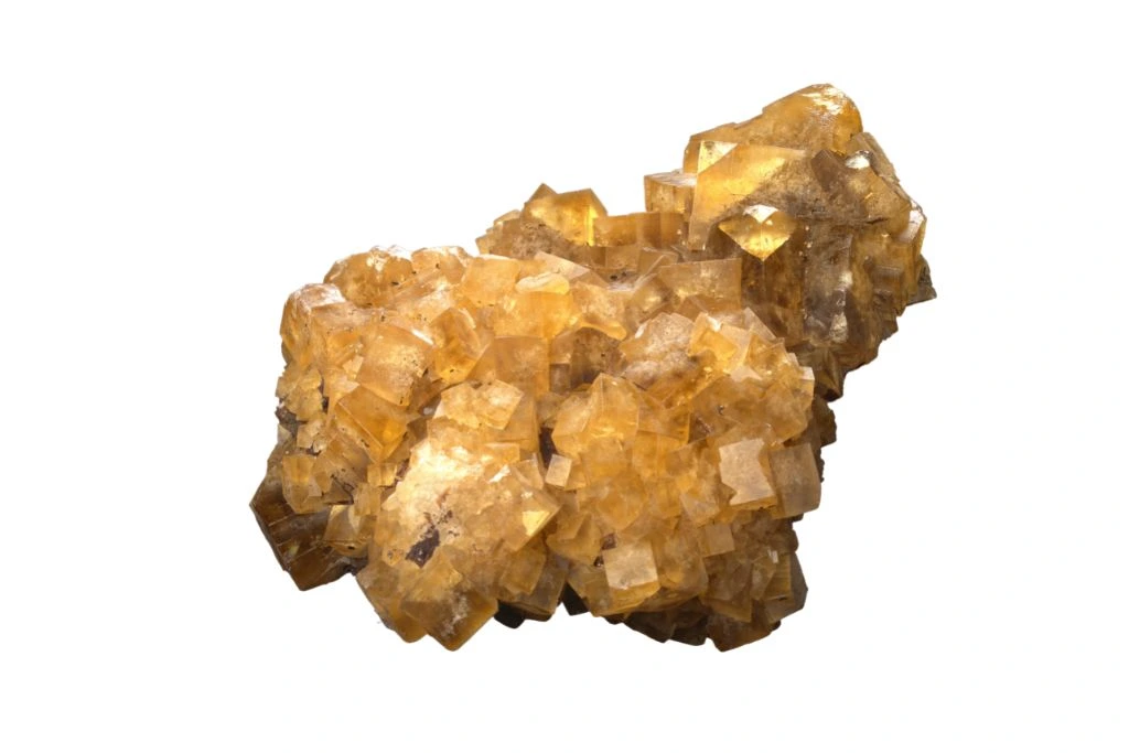 Raw Orange Fluorite on a white background