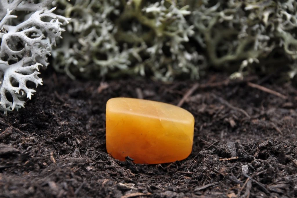 An orange calcite on the soil