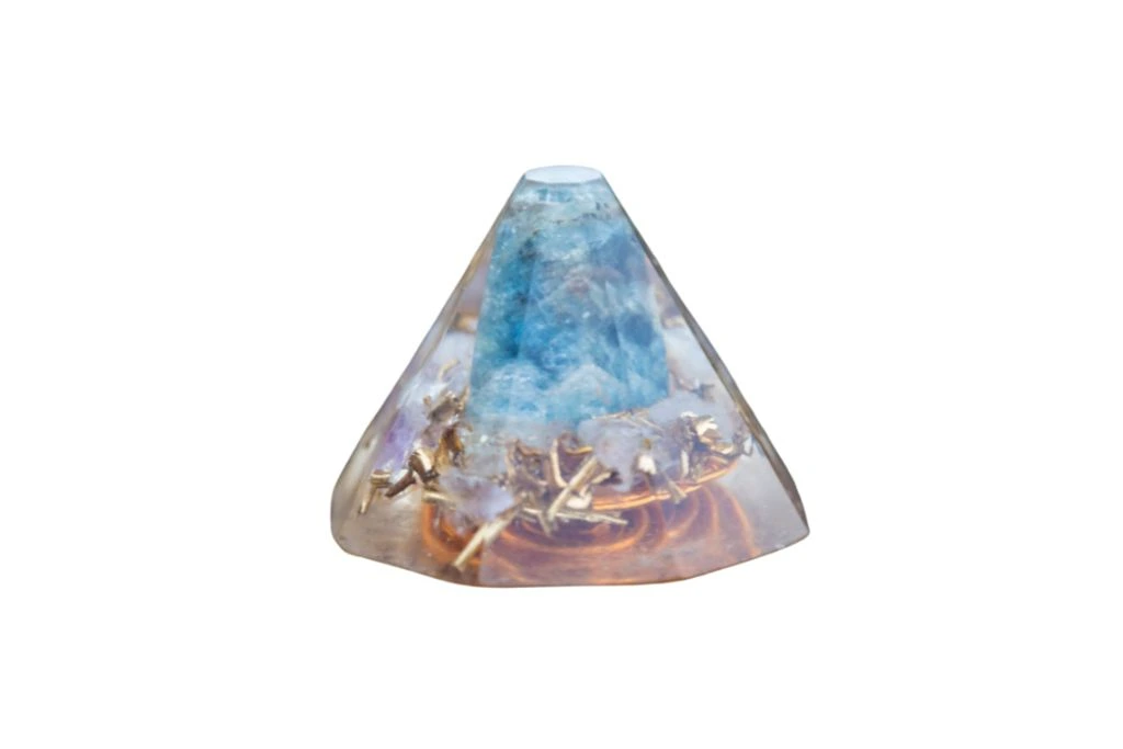 Orgonite Pyramid on a white background