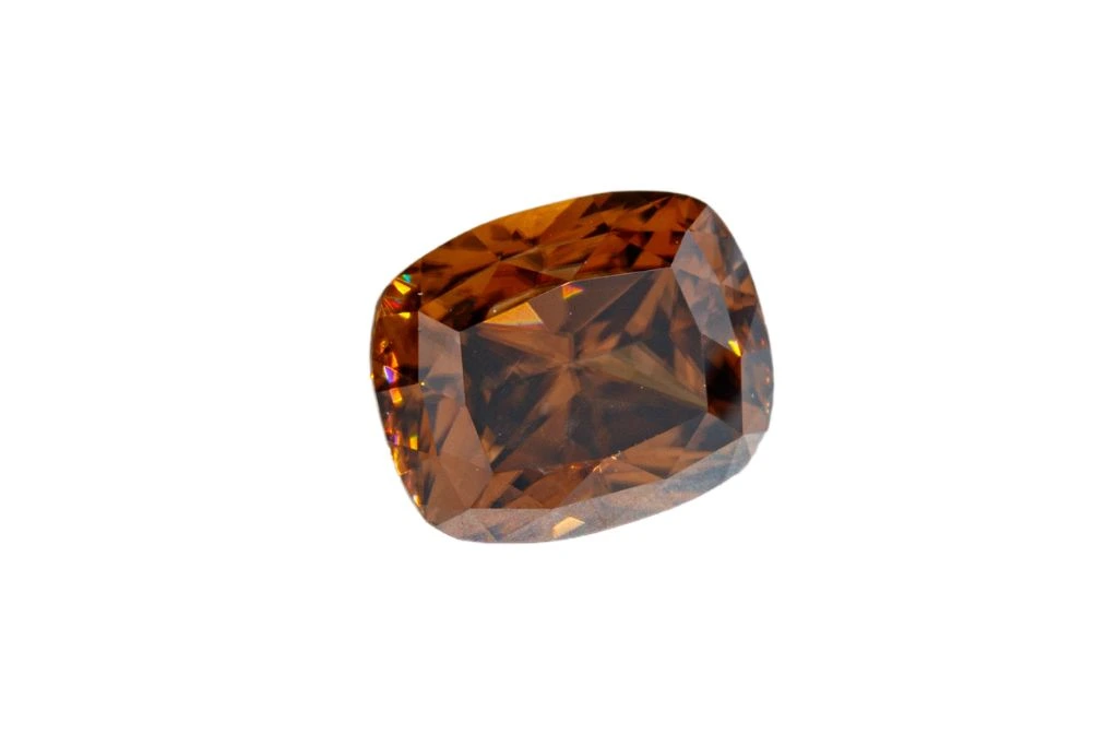 Polished Zircon Crystal on a white background
