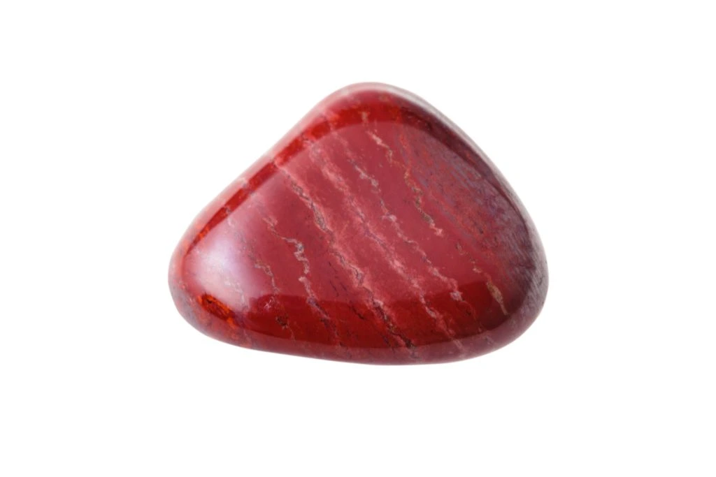 Polished Red Jasper Crystal on a white background