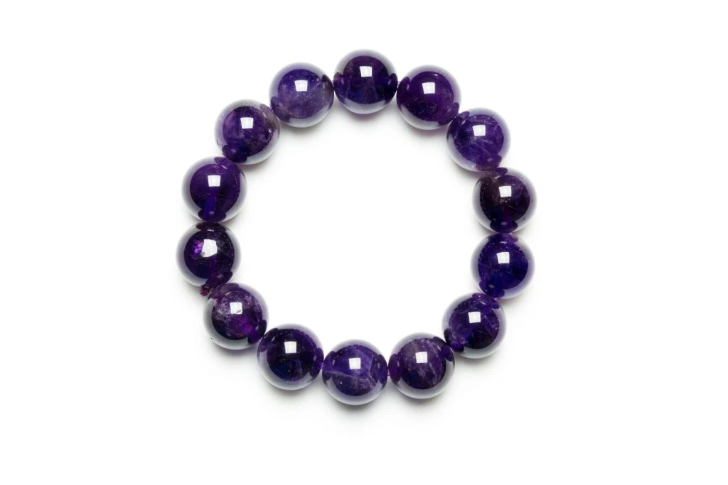 amethyst bracelet on white background