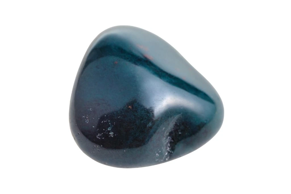 polished green bloodstone on white background