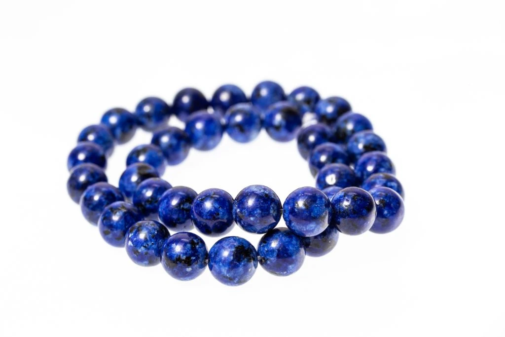 indigo colored bracelet on a white background