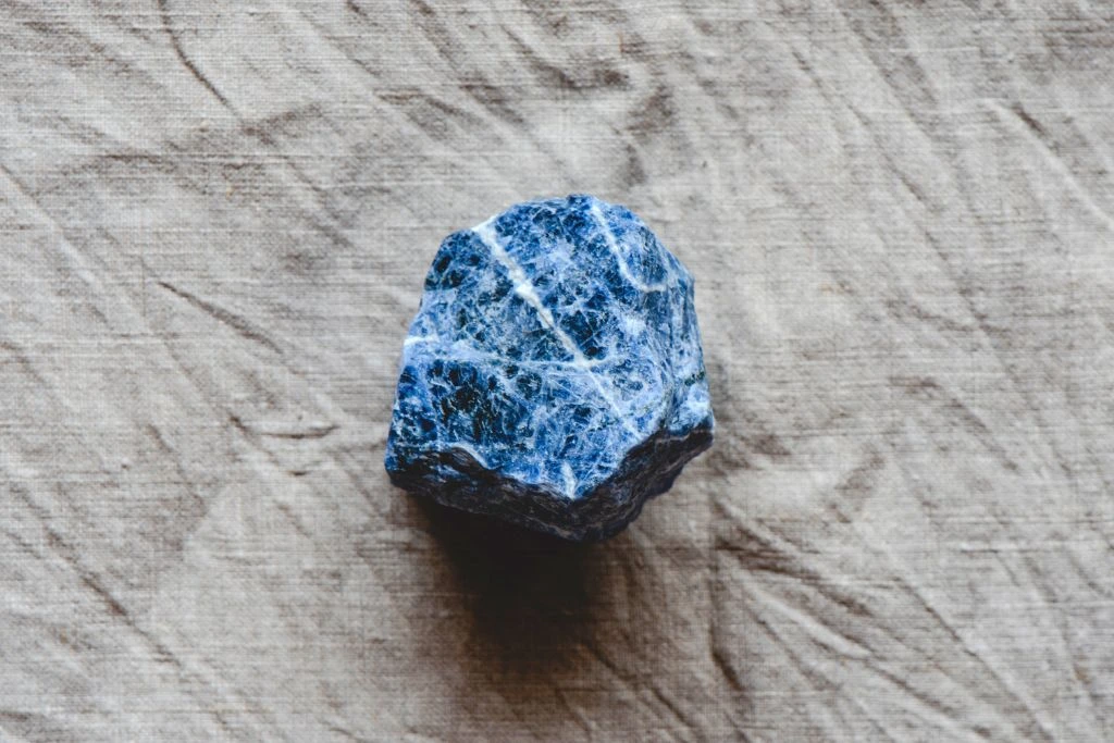 a Raw iolite on a cloth