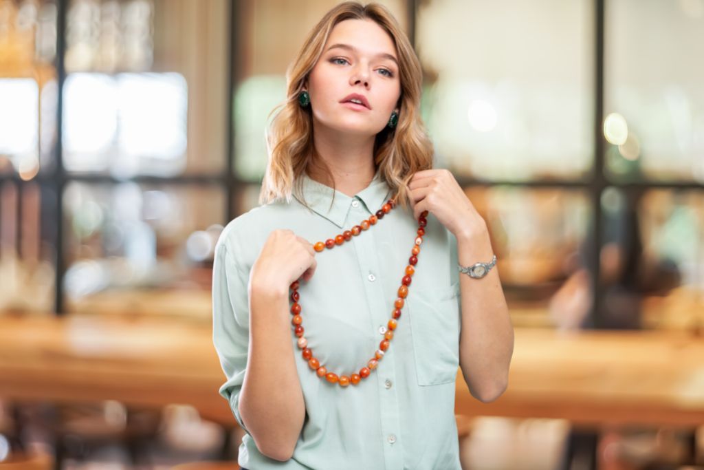 A woman trying a sardonyx crystal