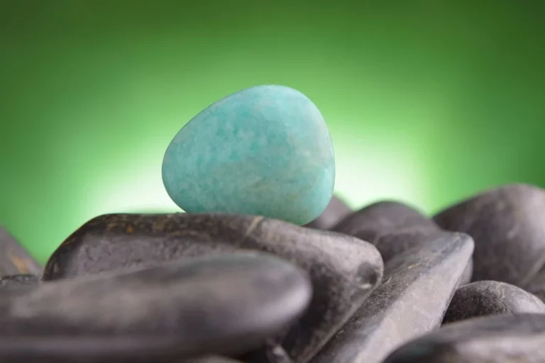 Amazonite crystal on top of the rocks