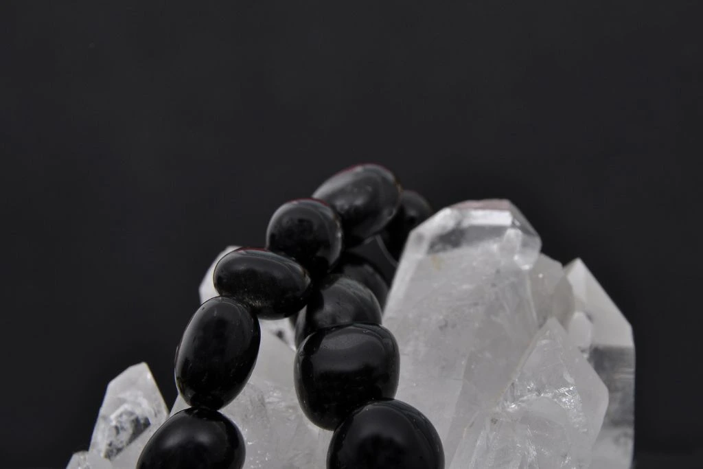 apache tears on a quartz crystal