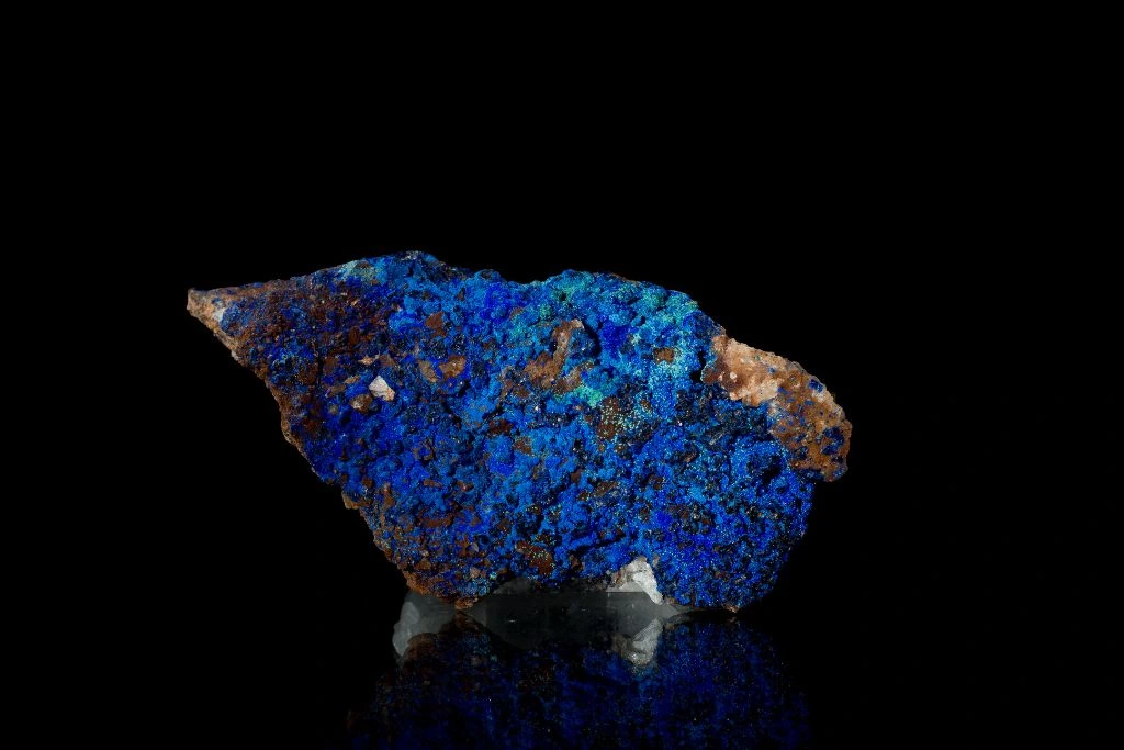 An azurite crystal on a black background