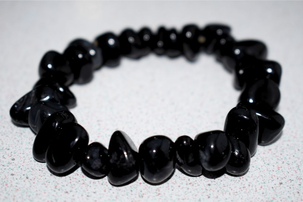 Black Tourmaline splintered crystal bracelet on a white circled-pattern table