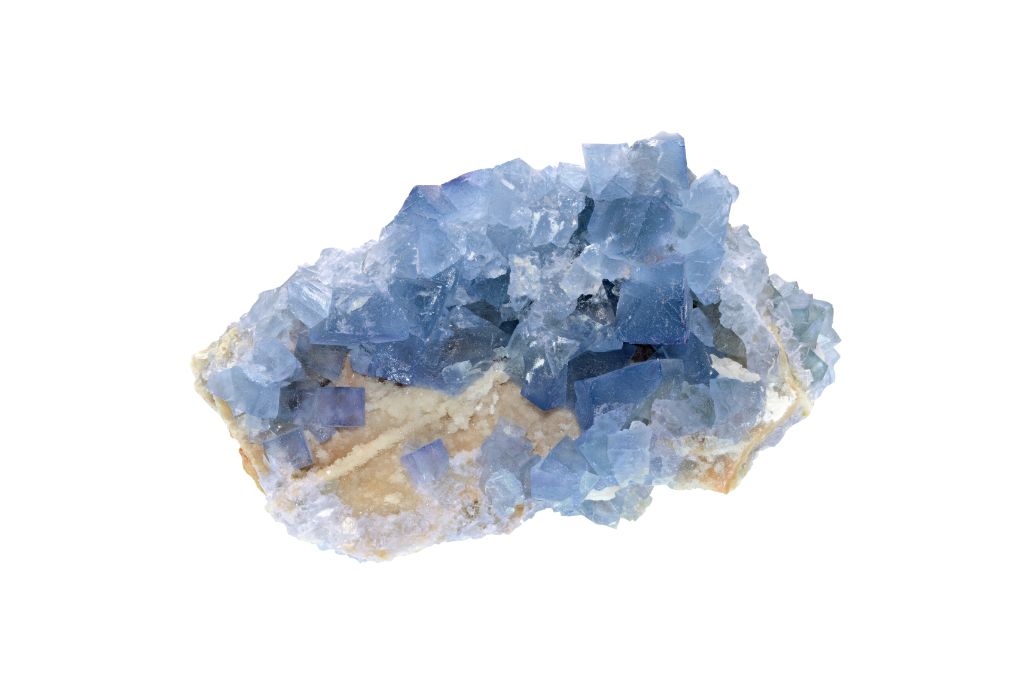 Blue Fluorite crystal on a white background
