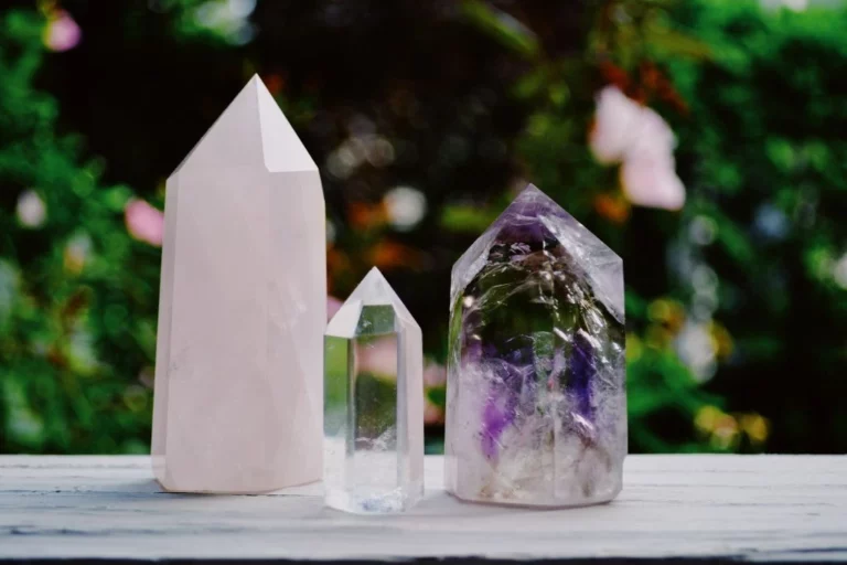 Crystals and glass on a table outside nature