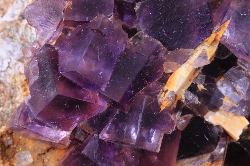 Fluorite mineral with several fluorite minerals on the background