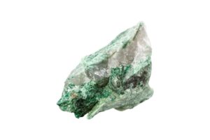 A raw fuchsite crystal on a white background