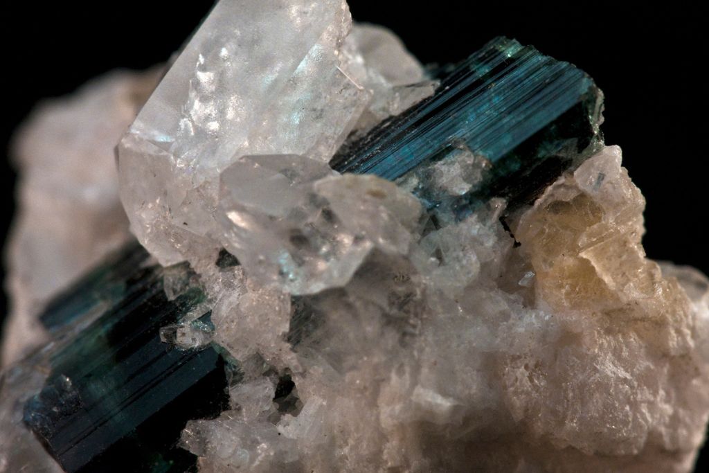 Indicolite gemstone embedded to quartz crystals. Indicolite stone x flickr.com Orbital Joe