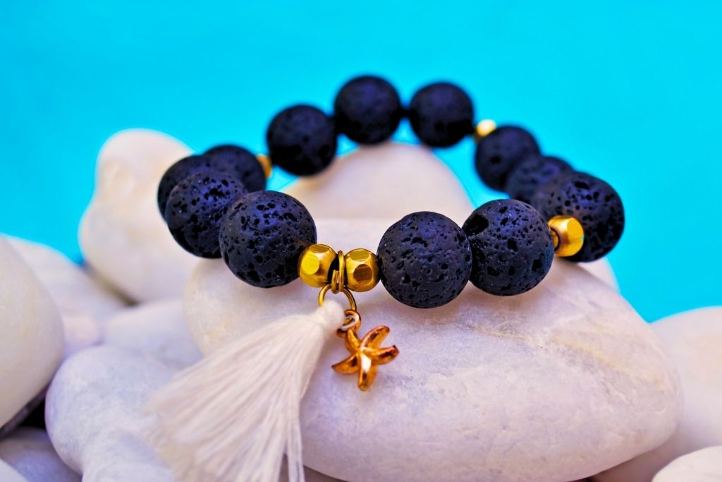lava stone beads bracelet with star pendant