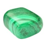 A polished malachite crystal on a white background