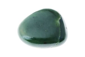 A polished Nephrite crystal on a white background
