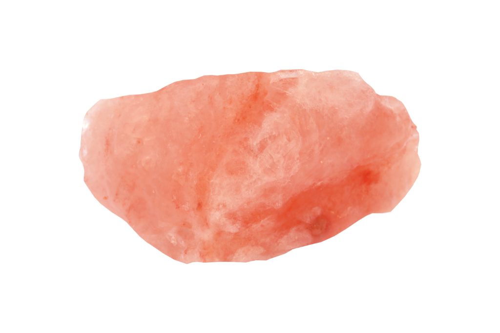 Pink halite on a white background
