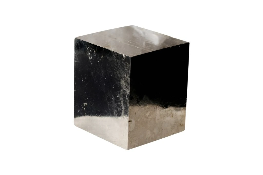 Pyrite cube shape on a white background