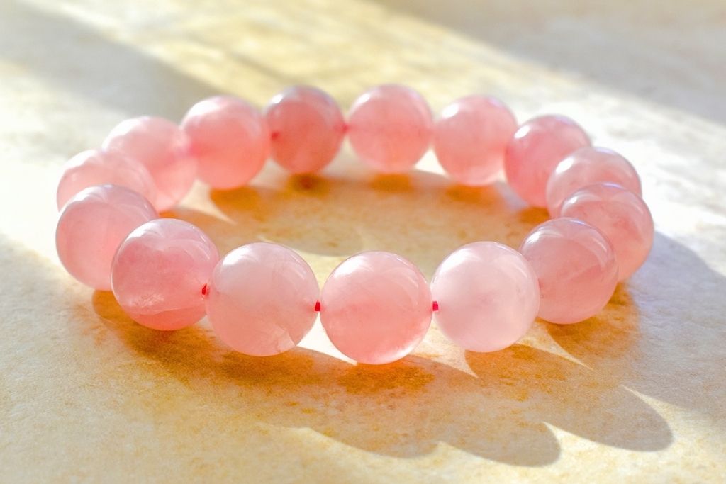 Rose Quartz Crystal bracelet with rays of sunlight