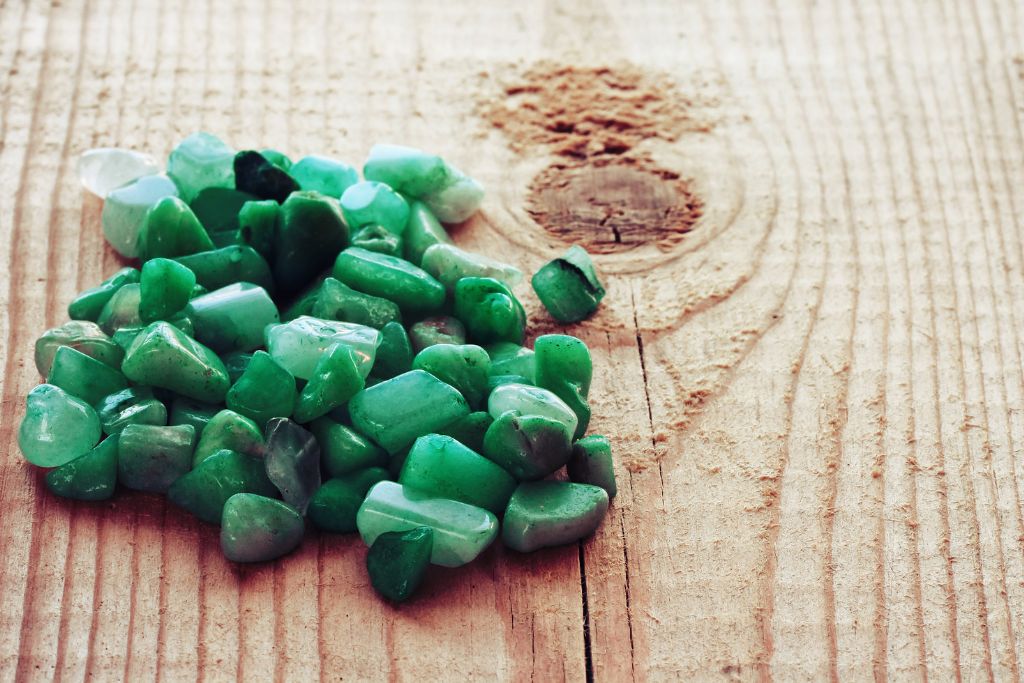 Small nephrite crystals on the wooden table