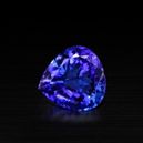 Tanzanite gemstone on a black background