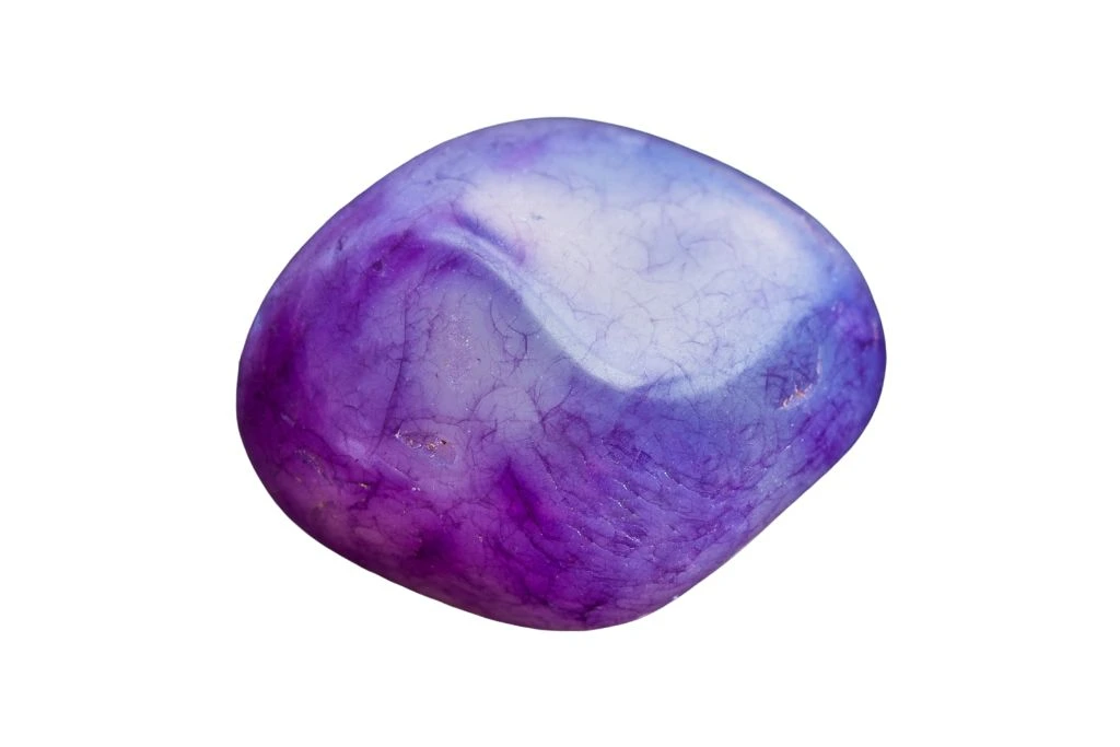 polished amethyst on a white background