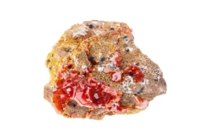 A vanadinite crystal on a white background