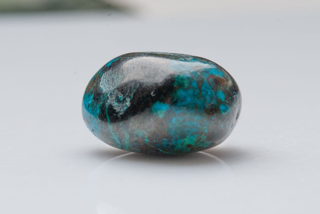 chrysocolla on grayish surface background