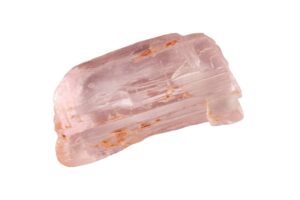 Kunzite crystal on a white background